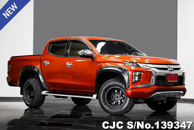 Mitsubishi Triton in Orange for Sale Image 0