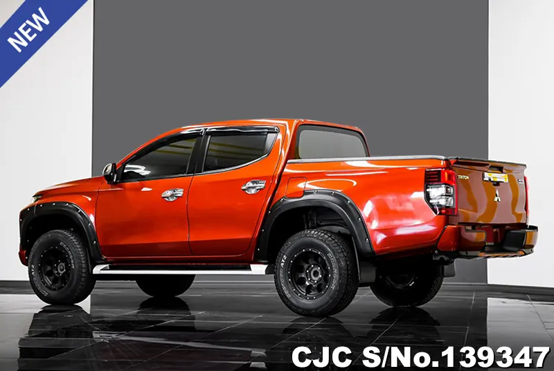 Mitsubishi Triton in Orange for Sale Image 1